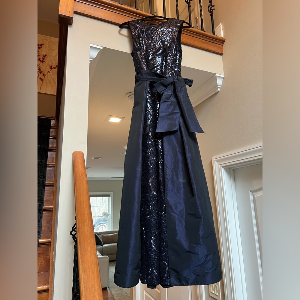 Teri Jon sequined gown with attached train. Perfect for wedding or formal event.